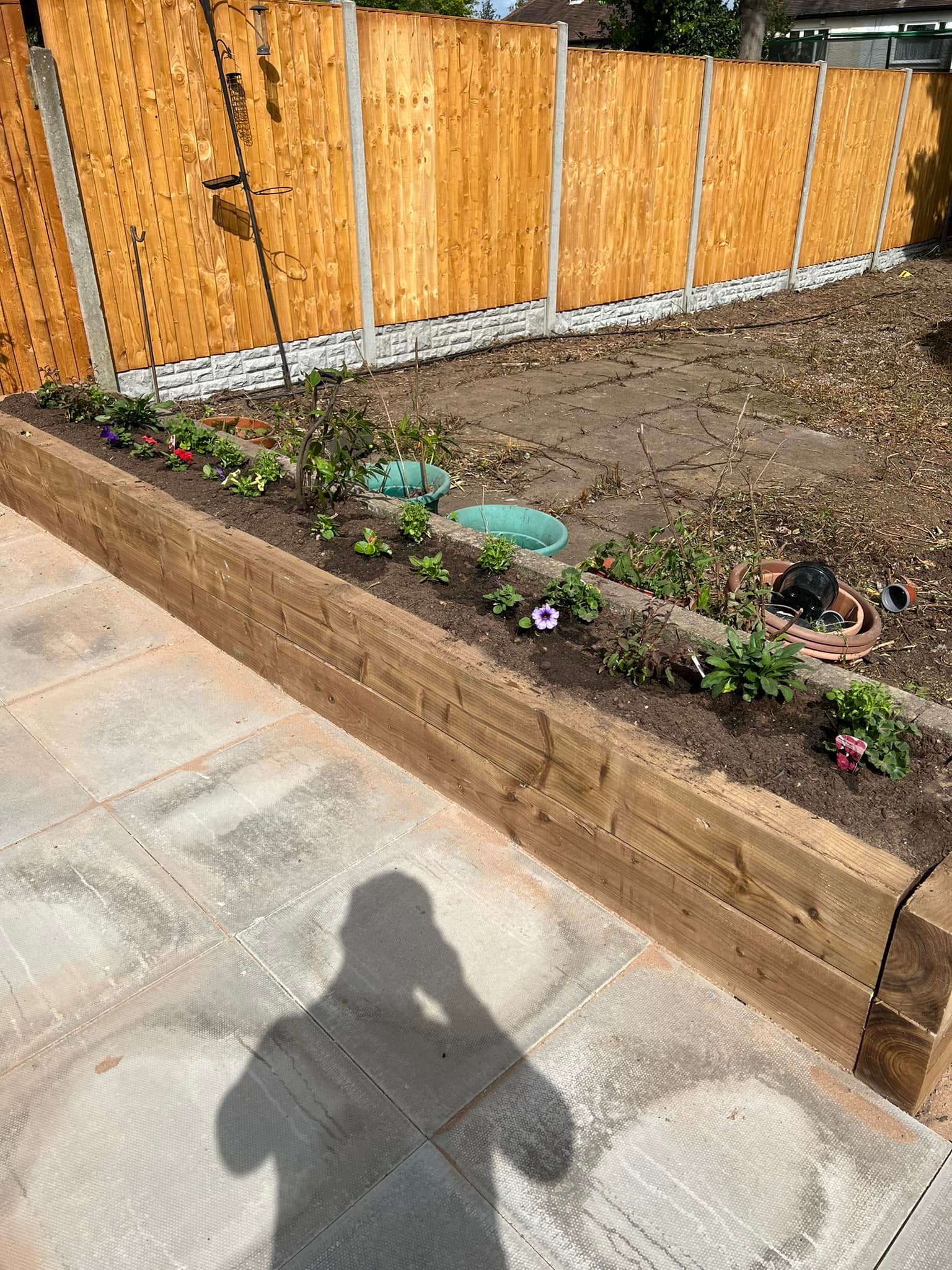 PLANTING TREES, FLOWER BEDS, AND DECKING